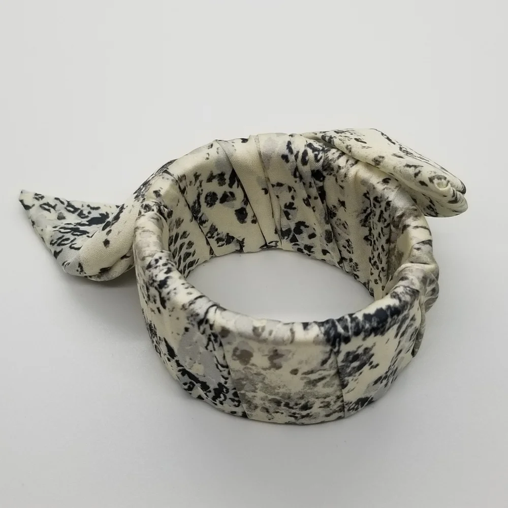 fabric wrapped hinged bangle with bow
